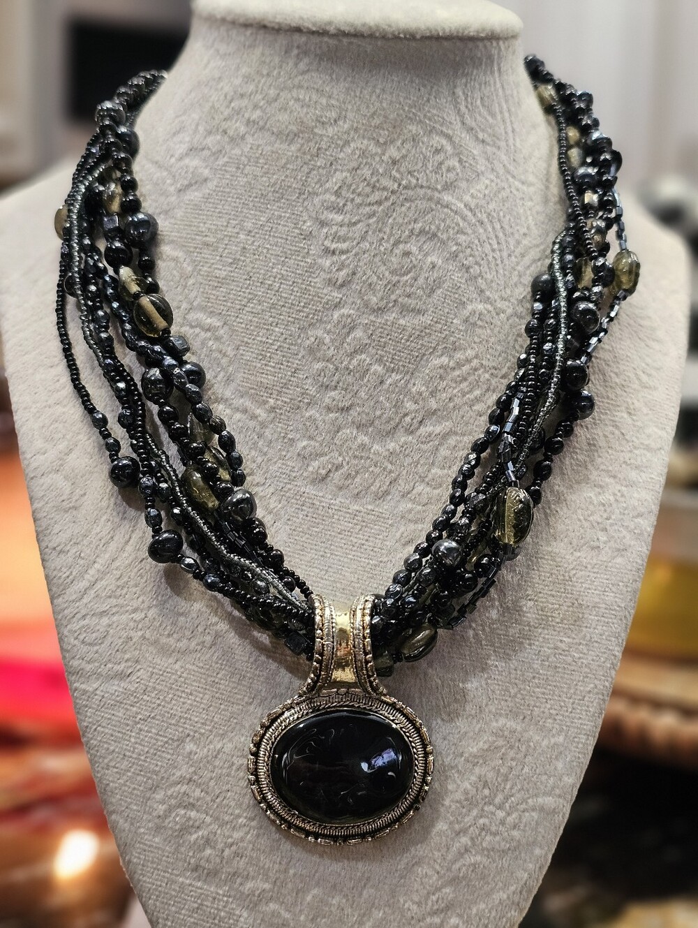 Multi-Strand Black Beaded Necklace with Black Pendant